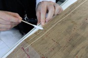 Removal of the small fragments of adhesive that are on the red lining