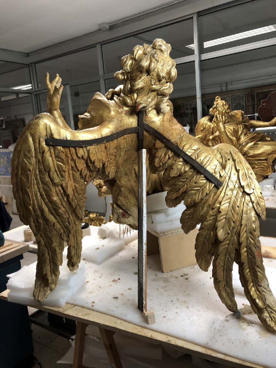Angel with metallic support after cleaning