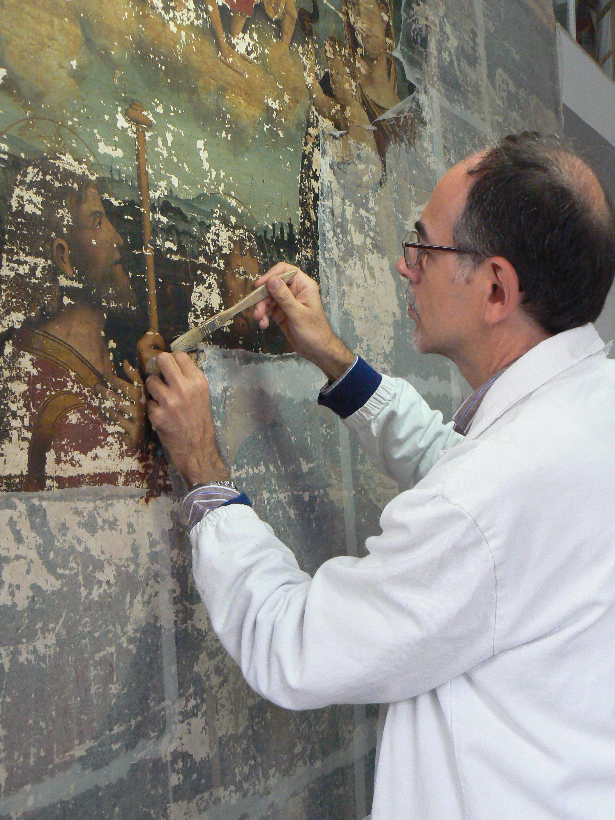 Assumption of the Virgin Mary with Saints - Restorer Marco Pratelli working on the painting